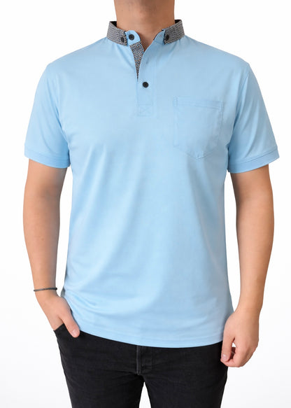 Polo col contraste avec poche